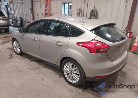 2015 Ford Focus Titanium from USA, damaged, VIN 1FADP3N27FL328473